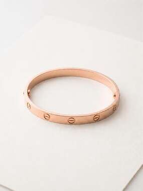 Rosegold clip on fashion screw motif bangle